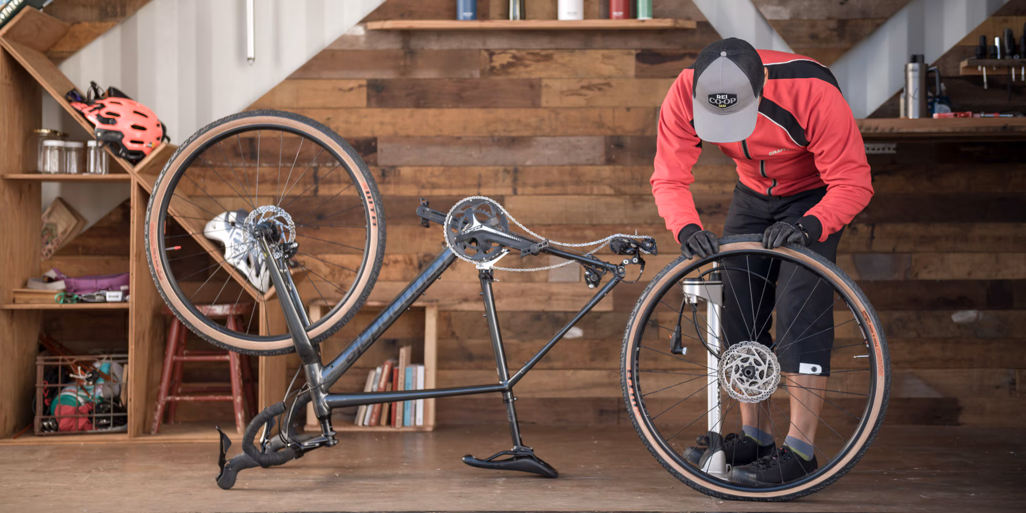 A person repairing a bike tire